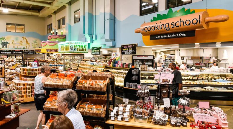 Customers shop at Jungle Jim’s International Market Friday, July 6 in Fairfield. NICK GRAHAM/STAFF