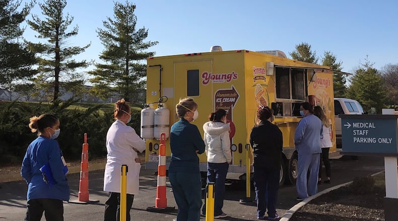 Young's Dairy has been giving away ice cream and cheese curds to frontline medical workers. On Wednesday, they were at Soin Medical Center in Beavercreek. STAFF/BONNIE MEIBERS