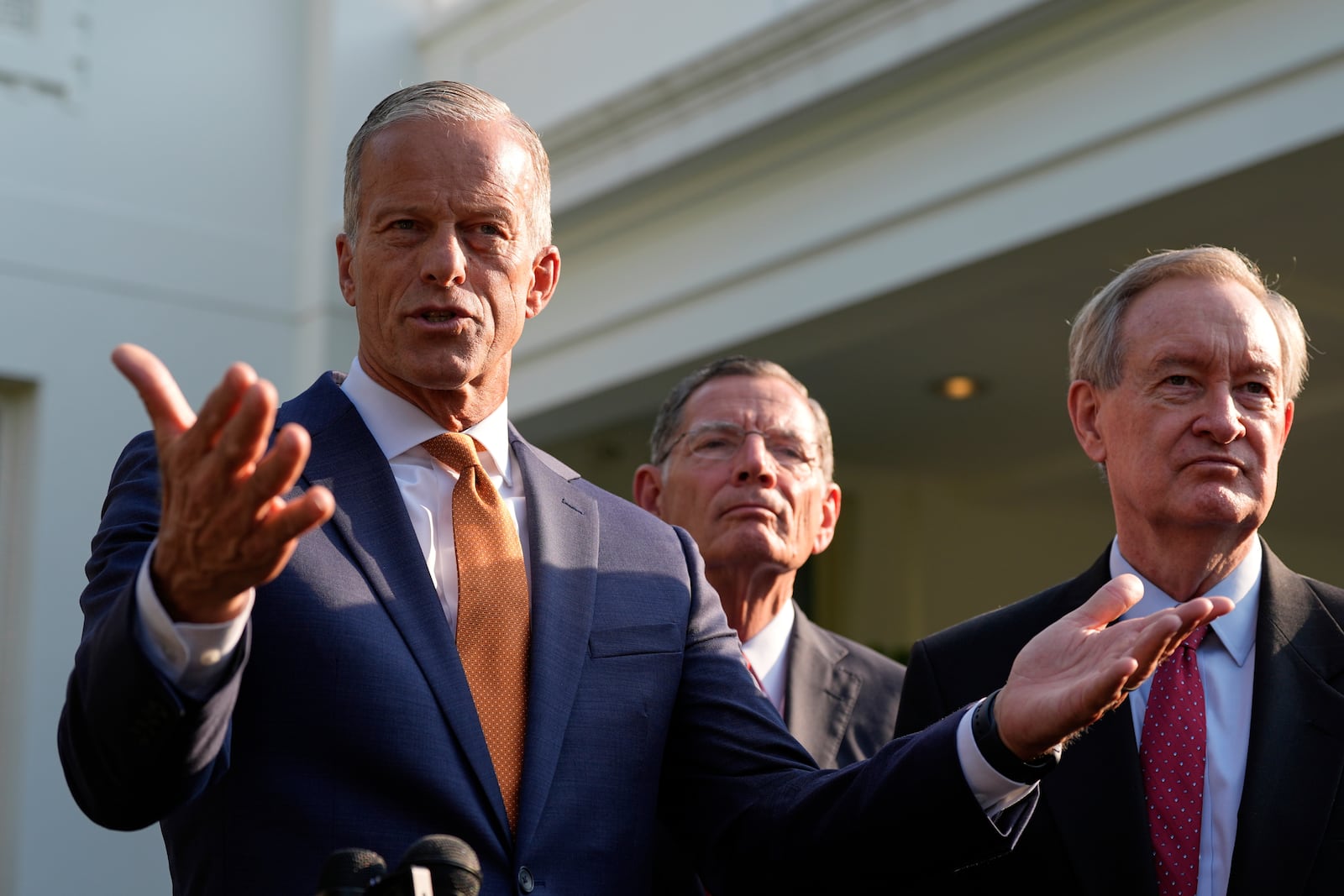 FILE - Senate Majority Leader John Thune, R-S.D., flanked by Sen. John Barrasso, R-Wyo., center, and Sen. Mike Crapo, R-Idaho, speak with reporters after meeting with President Donald Trump at the White House, June 4, 2025, in Washington. (AP Photo/Alex Brandon, file)