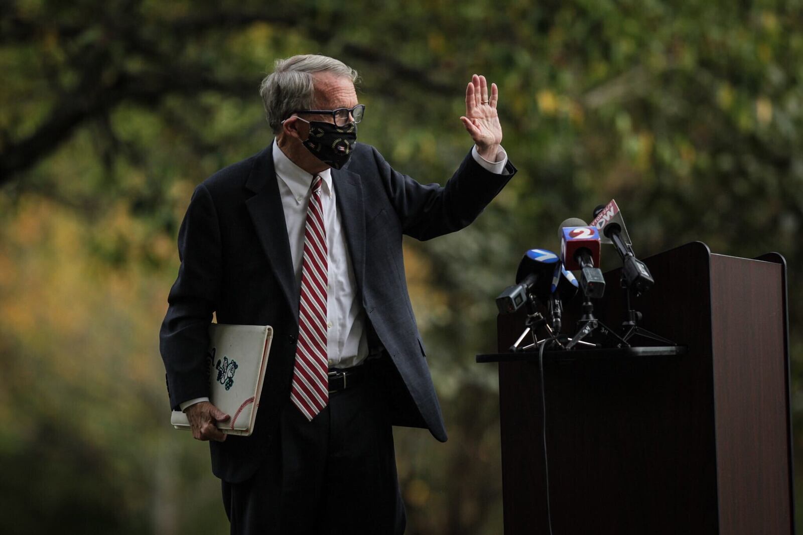 Ohio Gov. Mike DeWine visited Dayton's Patterson Homestead Friday, Oct. 9, 2020, where he gave an impromptu press conference urging greater mask usage. Ohio set a daily record Friday of more than 1,800 COVID-19 cases. JIM NOELKER/STAFF