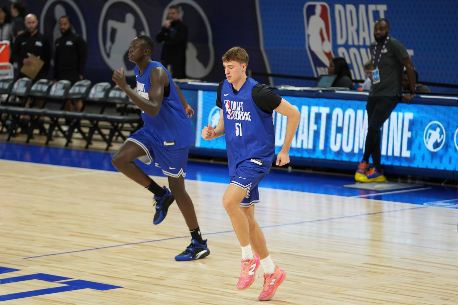 Khaman Maluach, left, and Cooper Flagg warm up on the court at the 2025 NBA basketball draft combine in Chicago, Tuesday, May 13, 2025. (AP Photo/Nam Y. Huh)