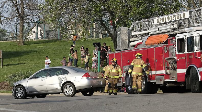 The Springfield Fire/Rescue Division responds to an auto accident at the intersection of East Main Street and Greenmount Avenue. Bill Lackey/Staff