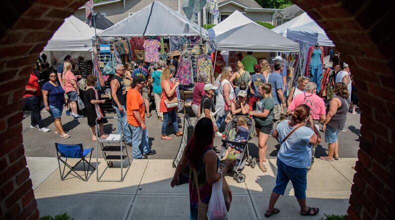 In this 2018 file photo, visitors to Yellow Springs enjoy music, crafts, food, entertainment and shopping at the Yellow Springs Street Fair. FILE