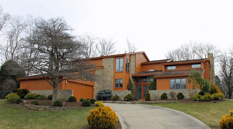 This 5-bedroom home with about 3,540 sq. ft. of living space boasts a full, finished basement and attached, 2-car garage. CONTRIBUTED PHOTO BY VICKIE KAPNAS