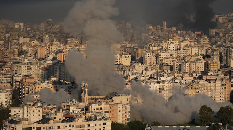 Smoke rises from Israeli airstrikes in Dahiyeh, a southern suburb of Beirut, Lebanon, Tuesday, March 3, 2026. (AP Photo/Hussein Malla)