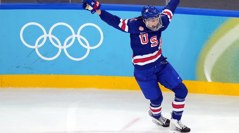 United States' Megan Keller celebrates after scoring the winning goal against Canada during the overtime period of the women's ice hockey gold medal game at the 2026 Winter Olympics, in Milan, Italy, Thursday, Feb. 19, 2026. (AP Photo/Carolyn Kaster)