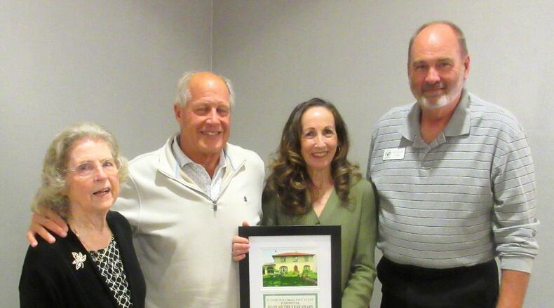 David and Kathy Johnson were named the Community Beautification Committee's 2023 Home of the Year winners for their outstanding property at 204 Ardmore Road in Springfield. From left to right: CBC Chair Marianne L. Nave, award winners David and Kathy Johnson, and CBC Co-Chairman Duane Sims. Contributed