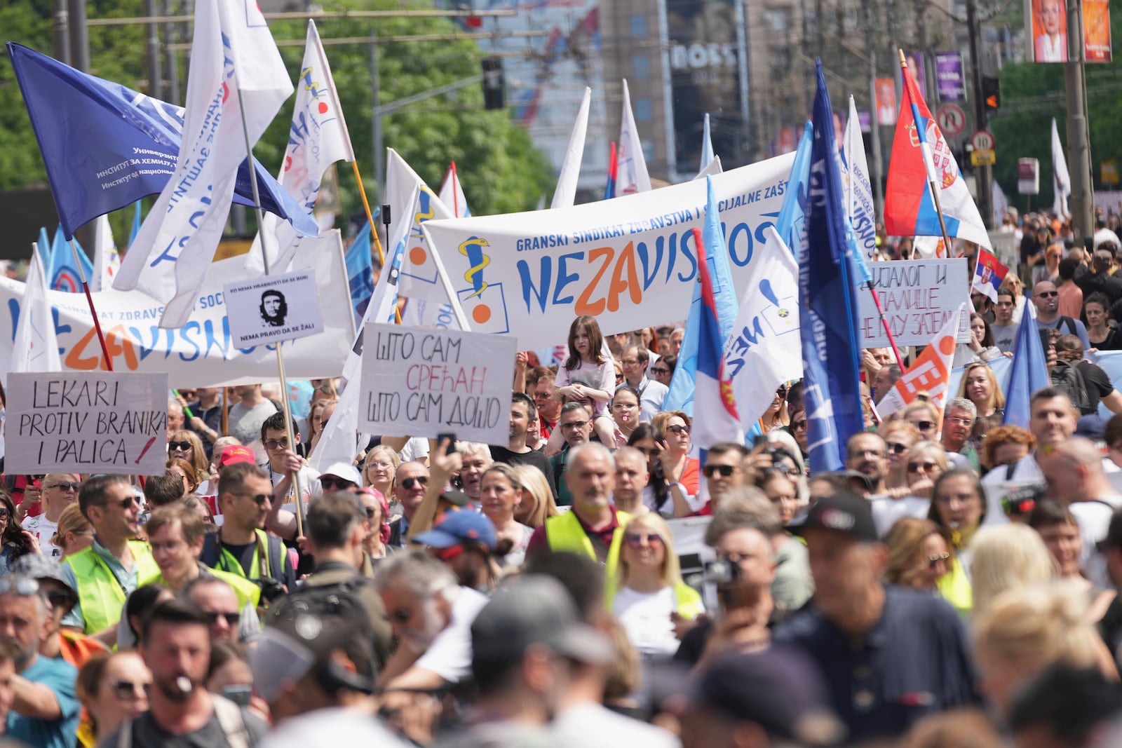 University students and people protest in front of the government building, six months after the deadly train station tragedy that sparked mass demonstrations against corruption, in Belgrade, Serbia, Thursday, May 1, 2025. (AP Photo/Darko Vojinovic)