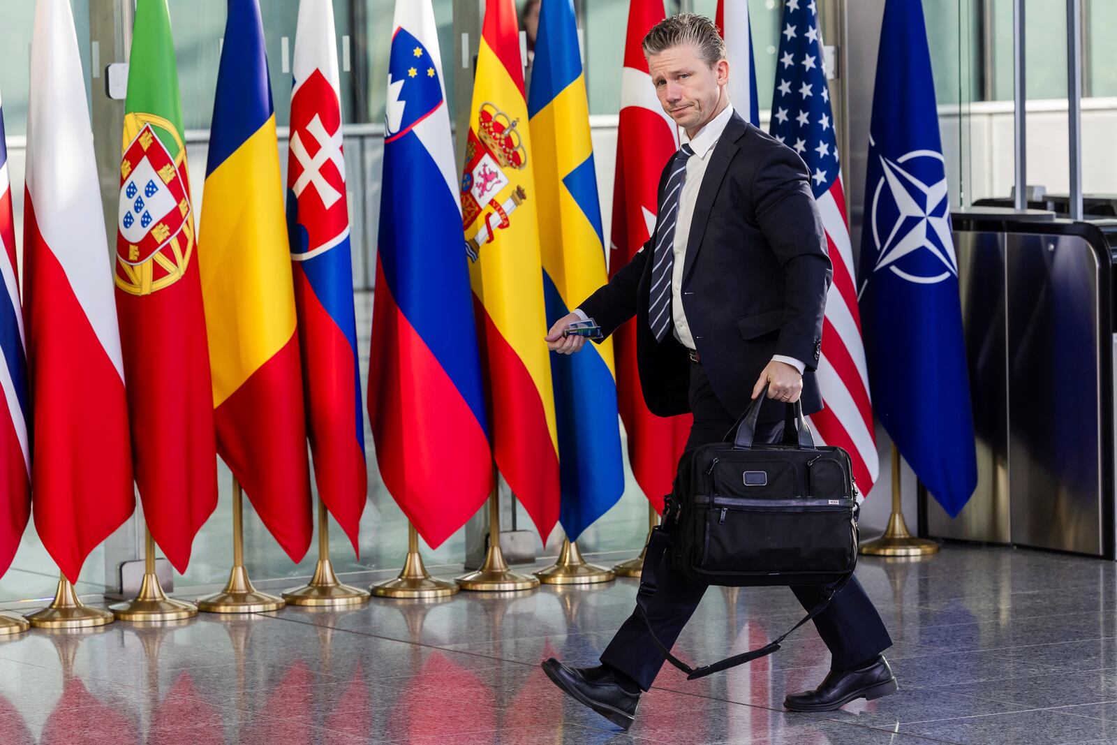 Sweden's Defense Minister Pal Jonson arrives for a meeting of the Ukraine Defence Contact Group at NATO headquarters in Brussels, Friday, April 11, 2025. (AP Photo/Geert Vanden Wijngaert)