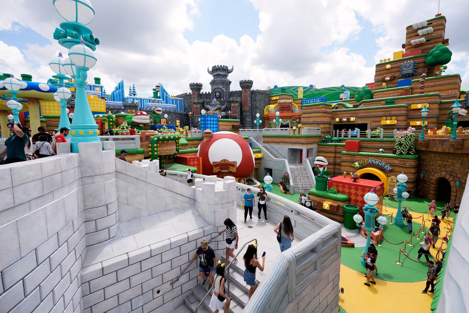 Guests check out the various parts of Super Nintendo World at Epic Universe at Universal Resort Orlando Thursday, April 10, 2025, in Orlando, Fla. (AP Photo/John Raoux)