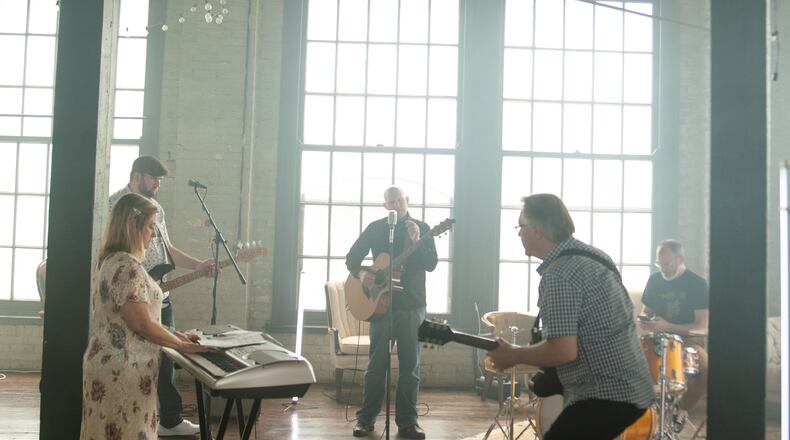 Springfield Christian music singer/songwriter leads fellow musicians during the filming of the music video for his song "Love Our Enemies" and relates to some of the country's current issues.