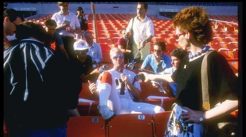 17 Jan 1989:  Quarterback Boomer Esaison # 7 of the Cincinnati Bengals meets the press before the Super Bowl XXIII game with the San Francisco 49ers at the Joe Robbie Stadium in Miami, Florida.  The 49ers won, 20-16. Mandatory Credit: Rick Stewart  /Allsp
