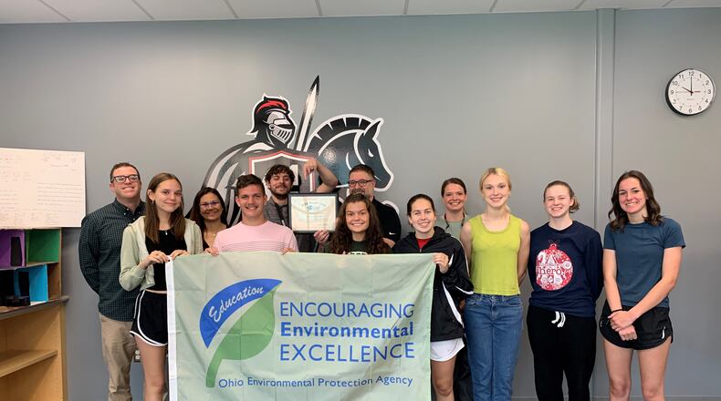 Thomas Jenkins, STEM teacher at Greenon Local Schools (far left) with the Lemelson-MIT Foundation InvenTeam, who was granted a patent by the U.S. Patent and Trademark Office for their invention of an animal-friendly net system to reduce manmade debris in local waterways. The team was also recognized by Laurie Stevenson, the Director of the Ohio EPA, for the potential environmental impact of their patented invention. Contributed