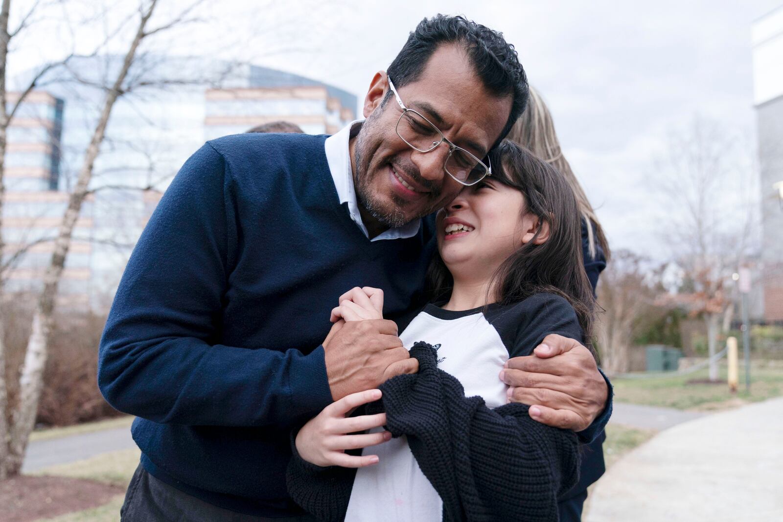 FILE - Former Nicaraguan presidential candidate Felix Maradiaga hugs his daughter, Alejandra, after arriving from Nicaragua at Washington Dulles International Airport, in Chantilly, Va., on Thursday, Feb. 9, 2023, after inmates considered by many to be political prisoners of the government of Nicaraguan President Daniel Ortega arrived in Washington. (AP Photo/Jose Luis Magana, File)