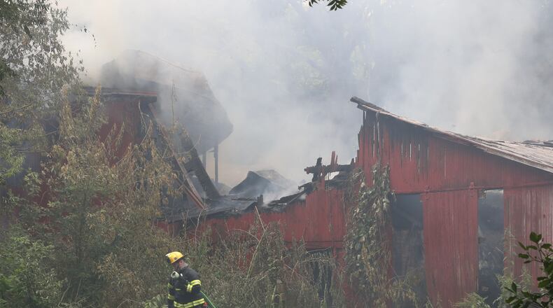 Multiple fire departments responded to a barn fire on North Hampton Road in Bethel Twp. on Friday, June 25, 2021. BILL LACKEY / STAFF