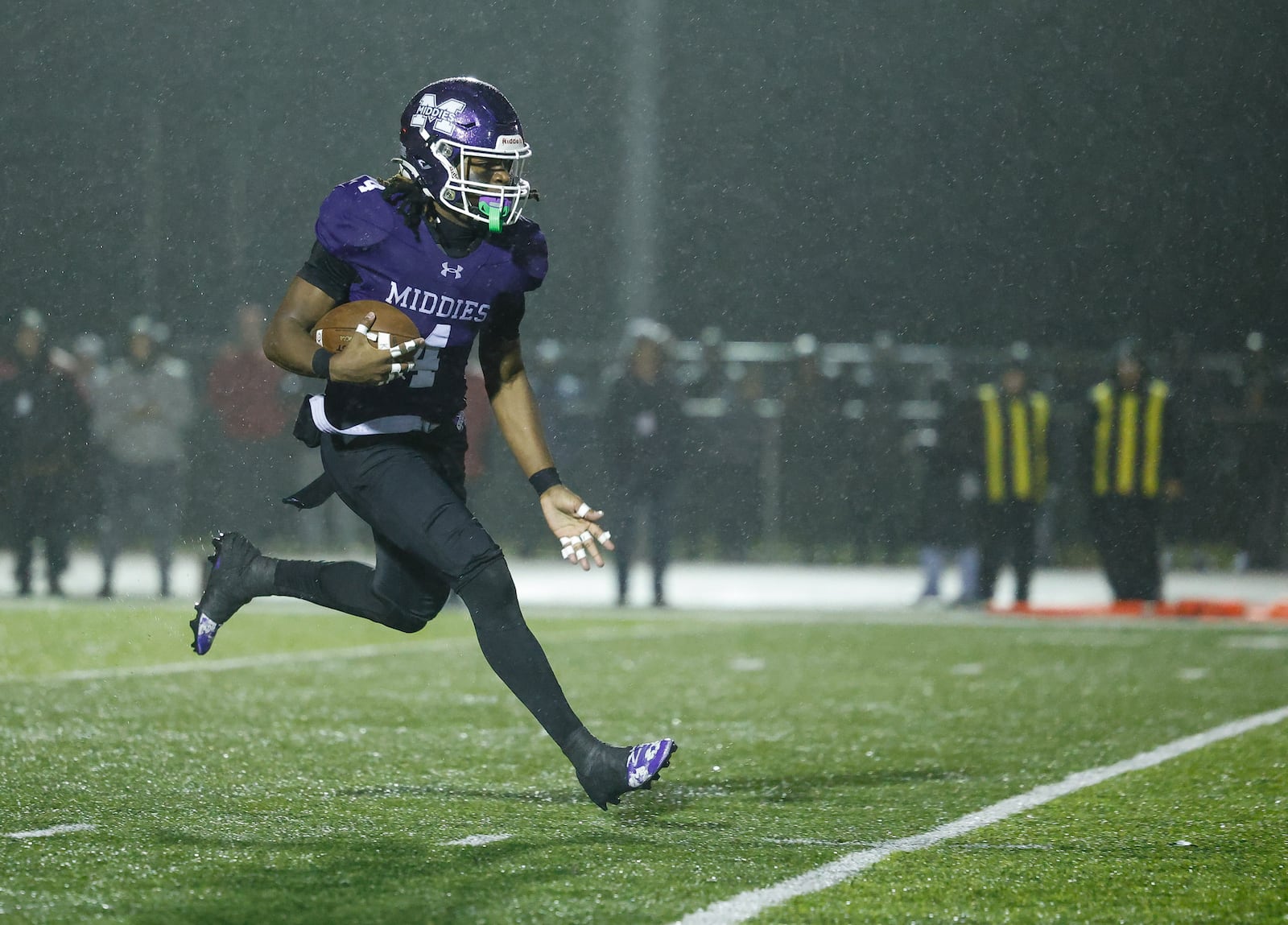 Middletown's Jordan Vann carries the ball during their Division I Regional football final against Wayne Friday, Nov. 21, 2025 at Trotwood Madison High School. Middletown won 21-14 to advance. NICK GRAHAM/STAFF