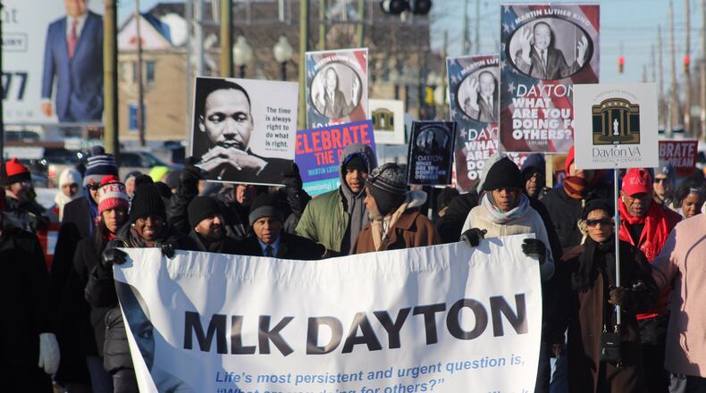 Hundreds of people gathered in Dayton on Martin Luther King, Jr. Day 2019 to march in celebration of the civil rights leader. Marchers started near The Charles Drew Health Center on West Third Street and ended at the Dayton Convention Center.