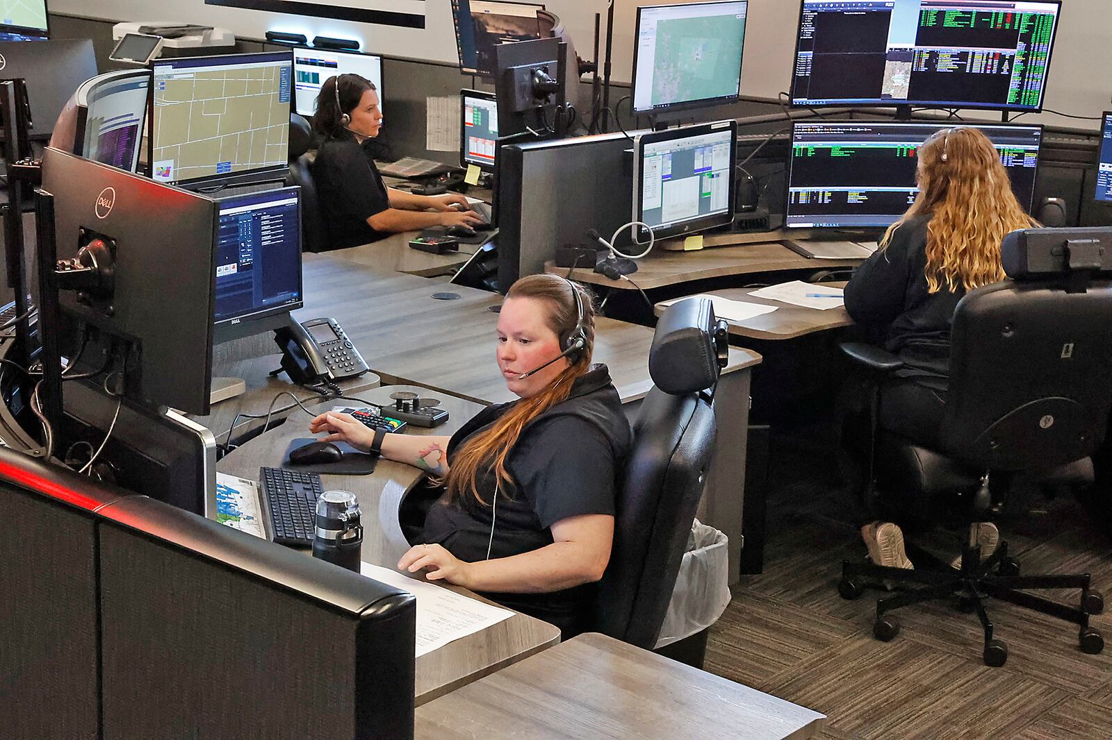 Dispatchers in the new 9-1-1 Communication Center at work Friday, August 25, 2023. BILL LACKEY/STAFF