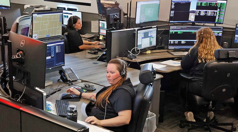 Dispatchers in the new 9-1-1 Communication Center at work Friday, August 25, 2023. BILL LACKEY/STAFF
