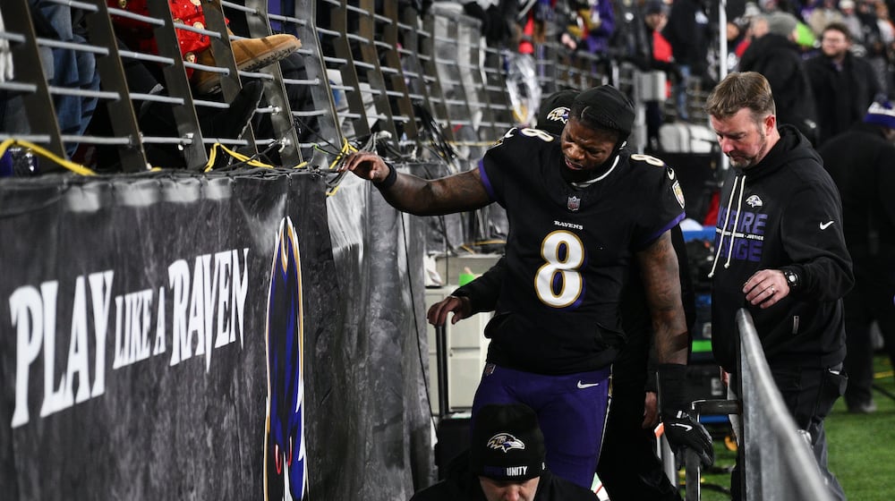 Baltimore Ravens quarterback Lamar Jackson (8) leaves the field during the first half of an NFL football game against the New England Patriots, Sunday, Dec. 21, 2025, in Baltimore. (AP Photo/Nick Wass)