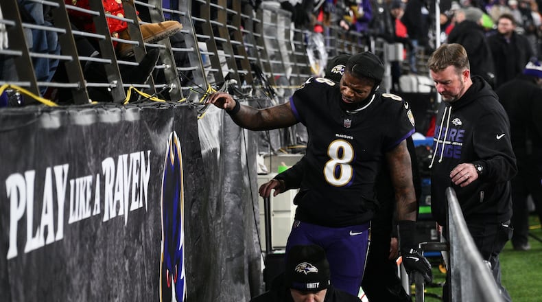 Baltimore Ravens quarterback Lamar Jackson (8) leaves the field during the first half of an NFL football game against the New England Patriots, Sunday, Dec. 21, 2025, in Baltimore. (AP Photo/Nick Wass)