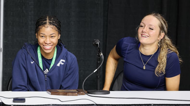 Fairmont senior guard Nico Cornett (right) and senior guard Kaylah Thornton smile during a news conference following a 61-55 overtime win over Princeton in the Division I state final on Saturday, March 14 at University of Dayton Arena. Thornton scored 19 and Cornett score 13. BRYANT BILLING / STAFF