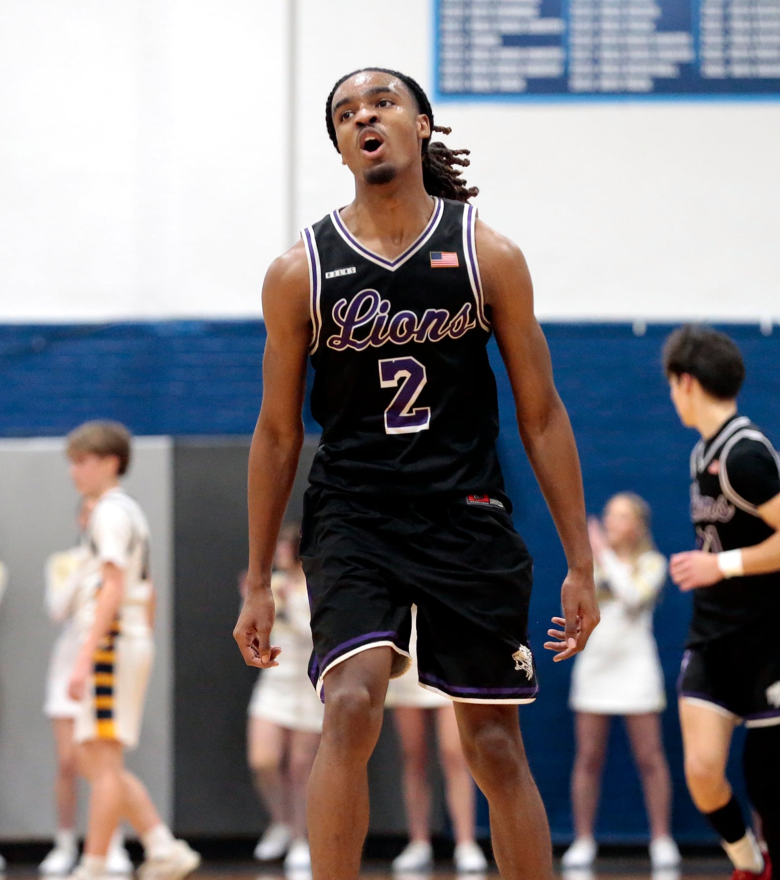 Emmanuel Christian senior Darryus Myers celebrates as he heads back on defense. Emmanuel Christian defeated Legacy Christian 56-44 to clinch the Metro Buckeye Conference championship on Friday, Feb. 6, 2026, in Xenia. STEVEN WRIGHT / STAFF