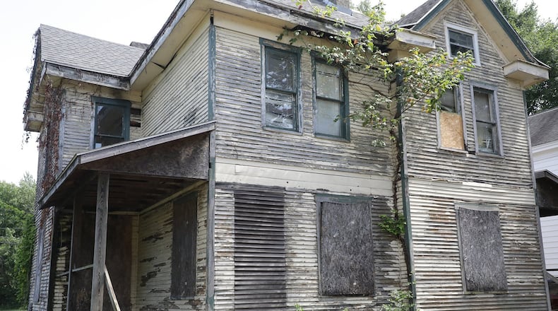 An abandoned house along South Fountain Avenue in Springfield. BILL LACKEY/STAFF