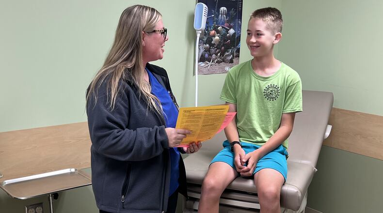 Wendy Owen, Public Health Nurse Supervisor and Isaac Royer-Miller of Trotwood in the Public Health Clinic located at 117 S Main St in Dayton. CONTRIBUTED