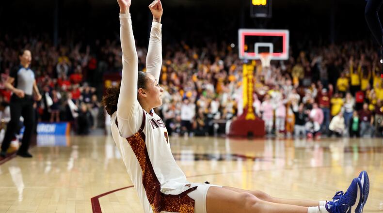 Minnesota guard Amaya Battle celebrates after her winning basket against Mississippi during the second half in the second round of the NCAA college basketball tournament, Sunday, March 22, 2026, in Minneapolis. (AP Photo/Matt Krohn)