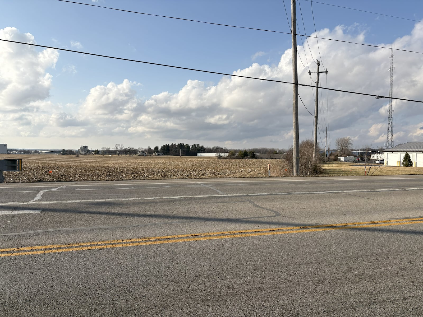 A field behind the Champaign County Building near the corner of State Route 55 and U.S. Route 68 in Urbana that is being considered for a potential data center. BROOKE SPURLOCK / STAFF
