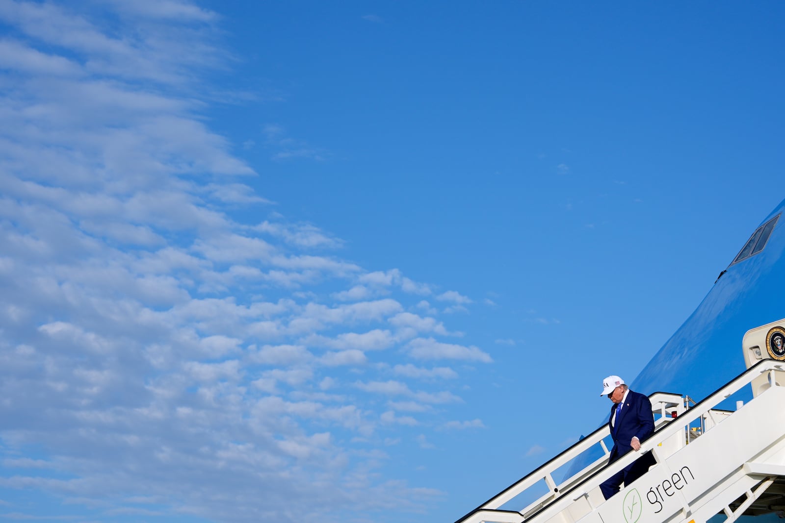 President Donald Trump exits Air Force One as he arrives at Amsterdam Schiphol Airport ahead of the NATO summit, taking place in The Hague, Netherlands, Tuesday, June 24, 2025. (AP Photo/Alex Brandon)