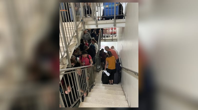 People trying to leave Israel are shown at the Ben Gurion Airport going down the stairwell to find shelter. Springfielders Larry and Kim Fish, who were in Israel when Hamas attacked, were forced to seek shelter from incoming missiles as they worked to leave the country Saturday. Contributed/Kim Fish