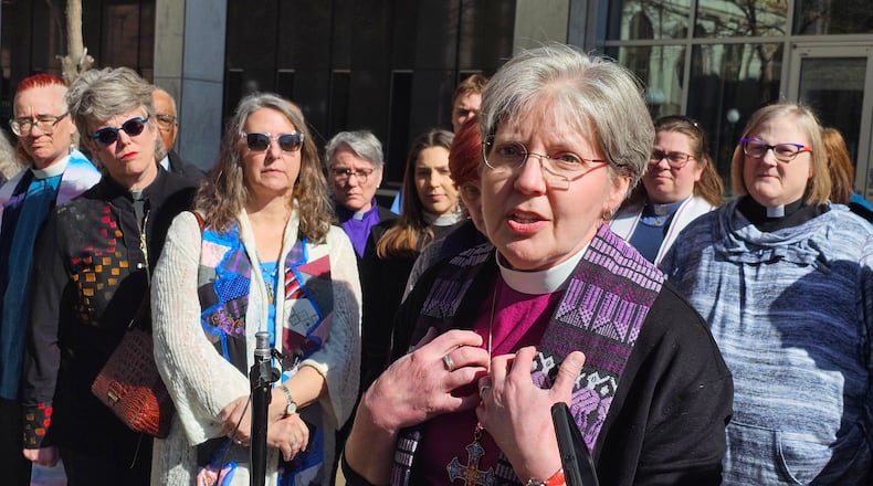 Bishop Jennifer Nagel, of the Minneapolis Synod of the Evangelical Lutheran Church in America, speaks to reporters outside the federal courthouse in St. Paul, Minn., on Friday, March 20, 2026, after a federal judge ruled that clergy will be allowed to minister to immigrants in a holding facility at the headquarters of the Trump administration's enforcement surge in Minnesota. (AP Photo/Steve Karnowski)
