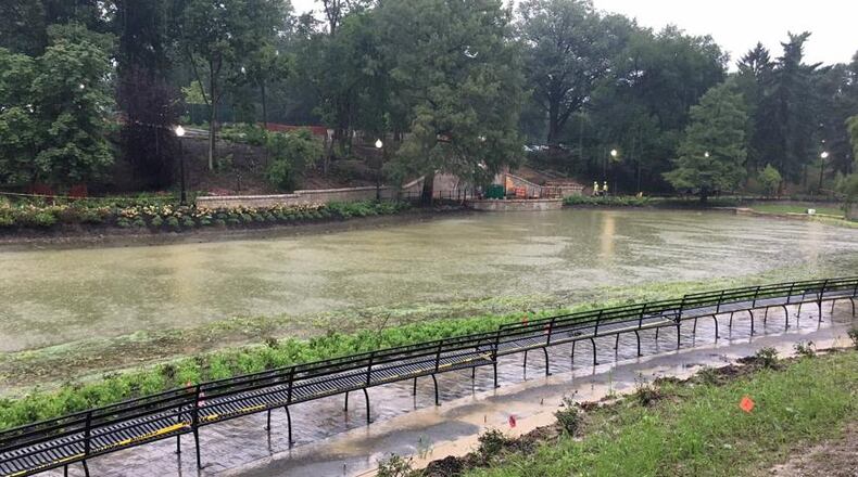 Construction crews are finishing work on an $8.4-million renovation of Mirror Lake on Ohio State’s main campus. The new landscaping and marshy edges are designed to discourage jumping in the lake and give the pond a more natural look. Photo: Laura A. Bischoff