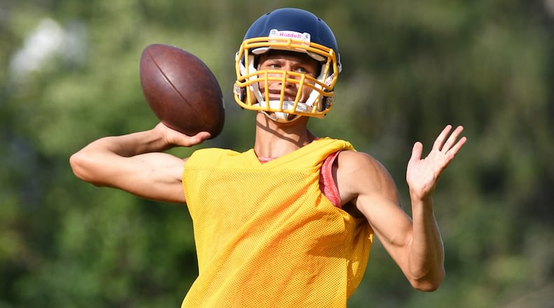 Tyler Carter throws a pass during a practice on Monday morning at Springfield High School. Carter is a senior who transfered from Wayne in the offseason and is one of the leading candidates to start at quarterback. Contributed Photo Bryant Billing