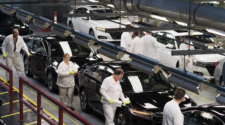 Employees look over 2018 Honda Accords in Marysville, Ohio. Ty Wright/Bloomberg