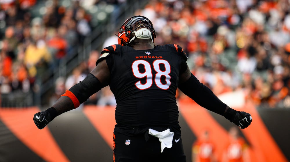 Bengals defensive lineman T.J. Slaton, Jr. celebrates a sack during their game against the Arizona Cardinals at Sunday, Dec. 28, at Paycor Stadium. JEREMY MILLER / CONTRIBUTED PHOTO