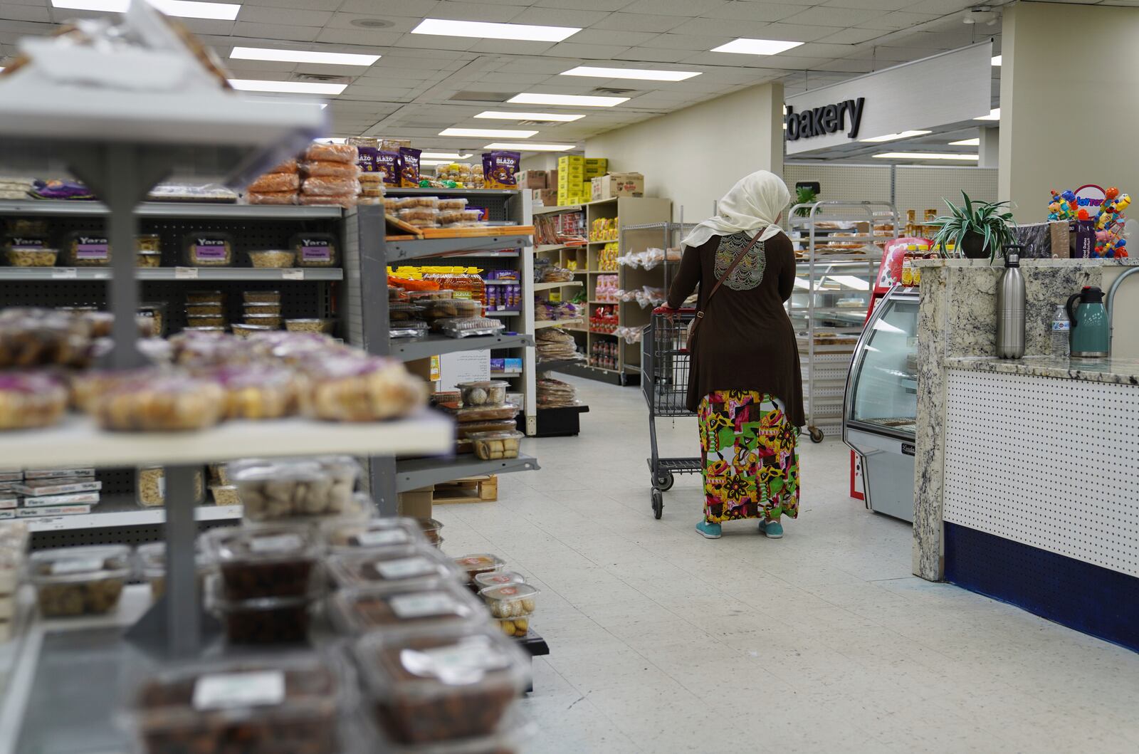 Locals shop at the Finest Supermarket halal grocery store in Fredericksburg, Va., on Monday, April 7, 2025. (AP Photo/Jessie Wardarski)