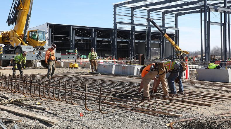 Workers place rebar at the Topre America construction site Monday, March 19. Topre announced plans to invest $73M and add 204 new jobs to Springfield. That is on top of an announcement last year the company planned to invest $55 million and create 55 jobs. Bill Lackey/Staff