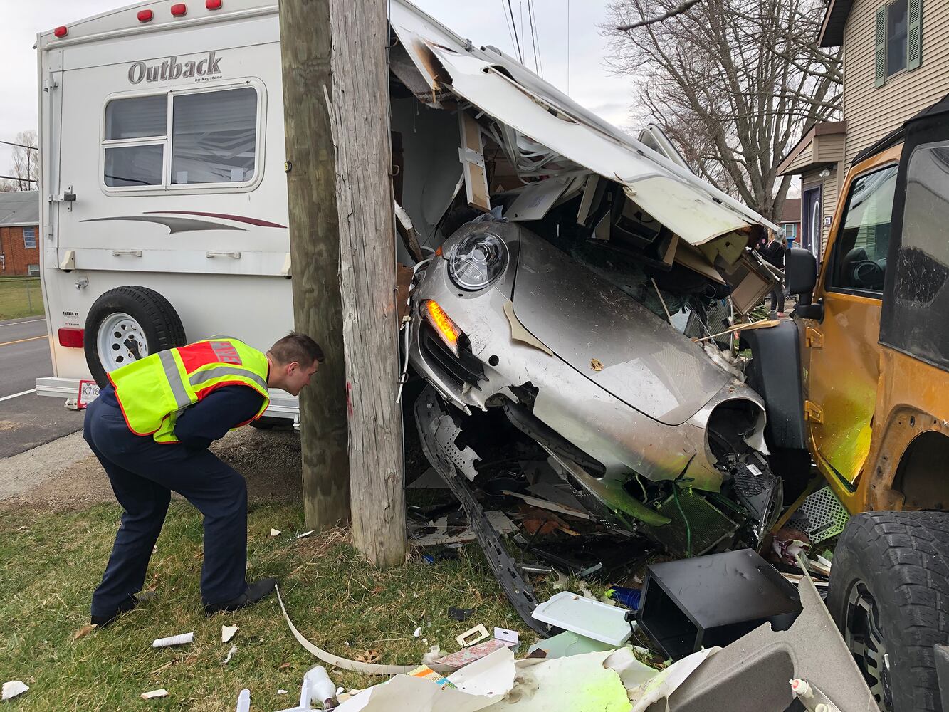 PHOTOS: Porsche Crashes Through Camper