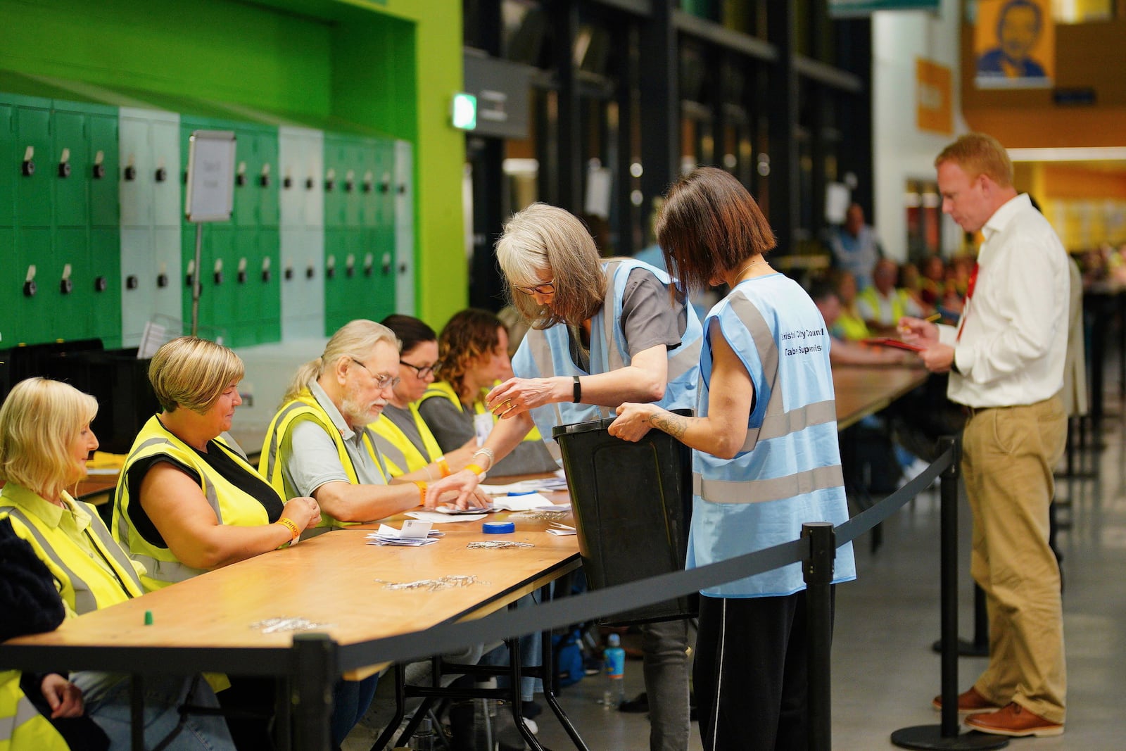 Votes are counted at Oasis Academy, in Bristol, England, for the Mayor of West of England Combined Authority, Thursday, May 1, 2025. (Ben Birchall/PA via AP)