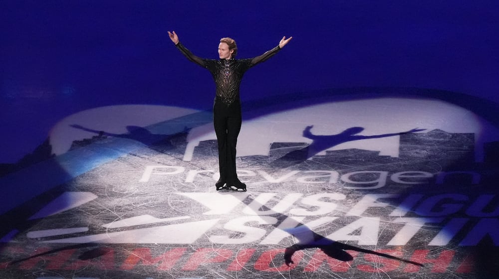 Gold medalist Ilia Malinin arrives for the metal ceremony after the men's free skate competition at the U.S. Figure Skating Championships, Saturday, Jan. 10, 2026, in St. Louis. (AP Photo/Jeff Roberson)