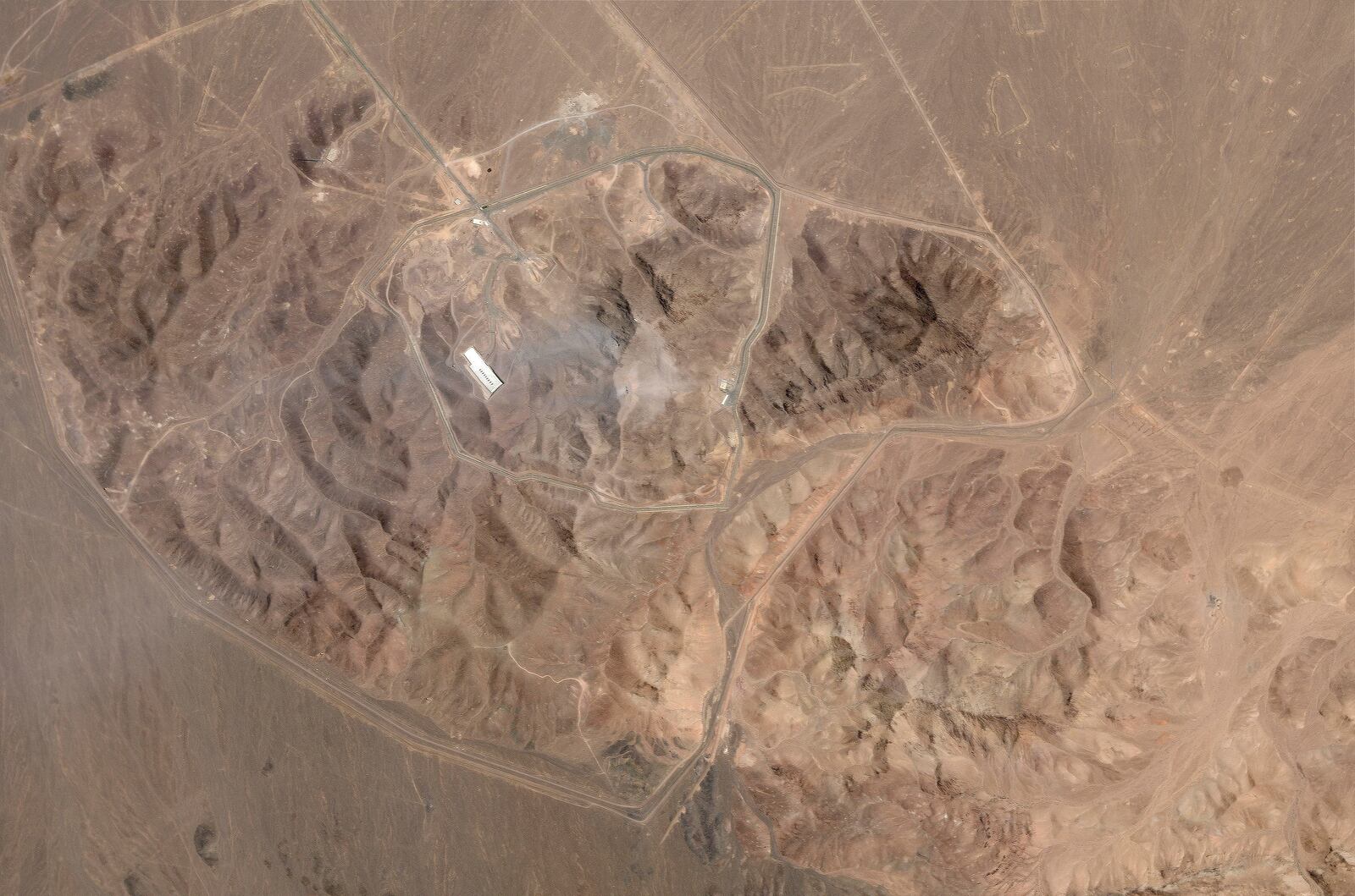 This satellite picture by Planet Labs PBC shows Iran's underground nuclear enrichment site at Fordo after a U.S. airstrike targeted the facility Sunday, June 22, 2025. (Planet Labs PBC via AP)