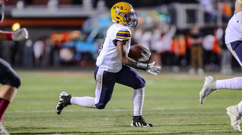 Springfield High School junior Deontre Long runs the ball during their game on Friday night at Beavercreek. The Wildcats won 60-8. Christian Cooper/CONTRIBUTED