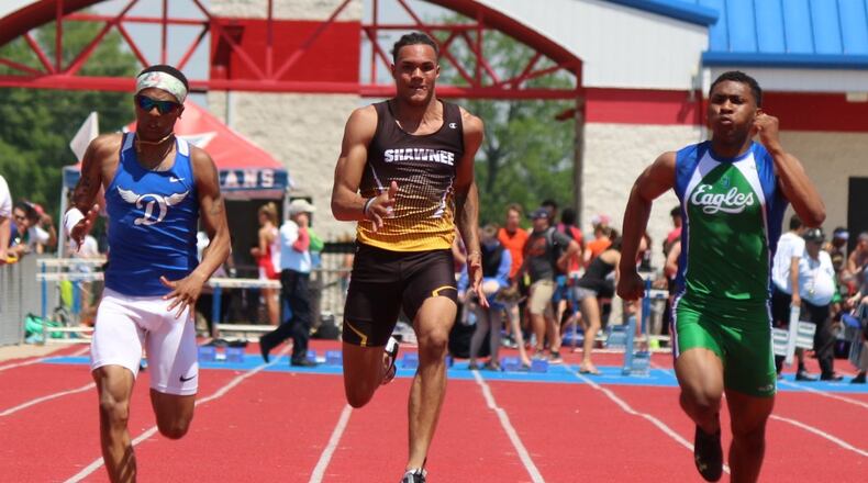 Shawnee’s Robie Glass (middle) battles Dunber’s Zamir Youngblood (left) and Chaminade Julienne’s Calvin Hatcher in the 100-meter dash at the Division II regional championships on Saturday. Greg Billing / Contributed