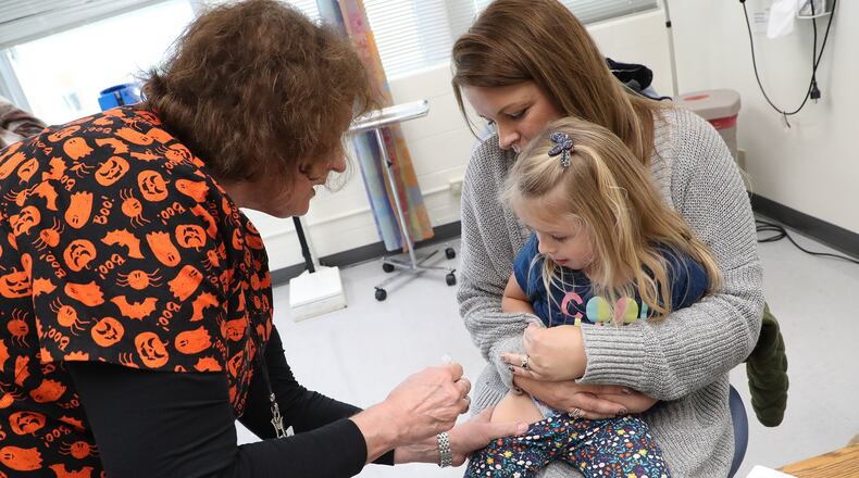 The flu shot continues to be the best protection against the flu, officials say as flu cases continue to rise in Clark County and across the Ohio. BILL LACKEY/STAFF