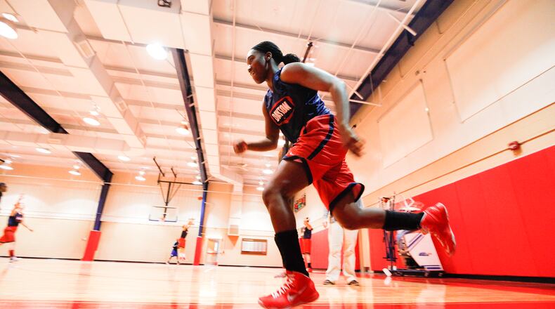 UD's Olivia Applewhite works out with her NCAA Tournament-bound Flyers as they prepare for their Sunday game against St. John's. CHRIS STEWART / STAFF