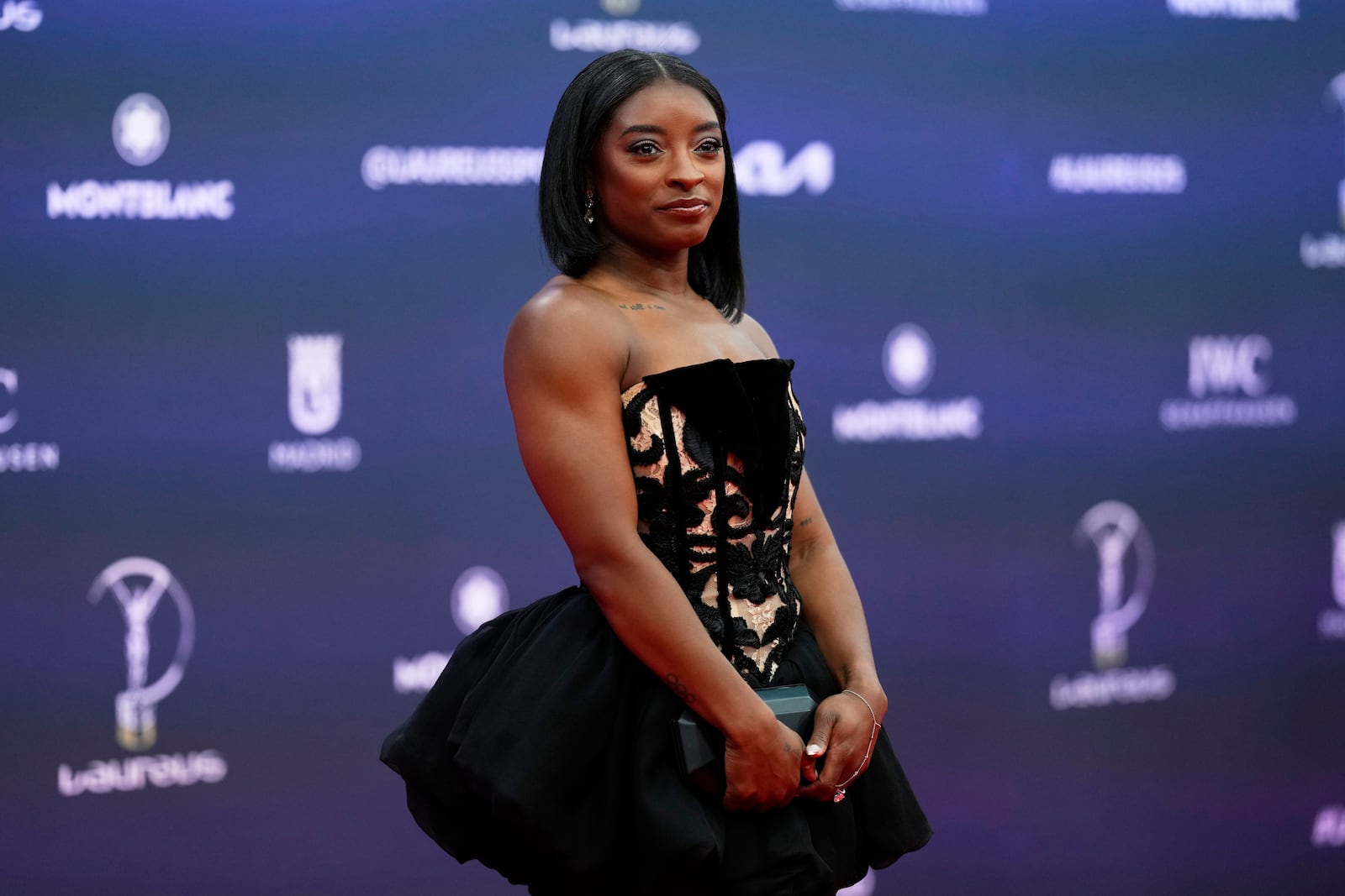 Simone Biles, of the United States, poses during the 2025 Laureus World Sports Awards in Madrid, Spain, Monday, April 21, 2025. (AP Photo/Manu Fernandez)
