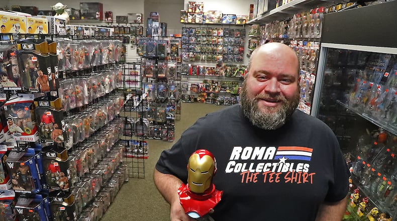 Aaron Detrick, the owner of Roma Collectibles The Toy Store, has thousands of toys in his new store on Upper Valley Pike. BILL LACKEY/STAFF